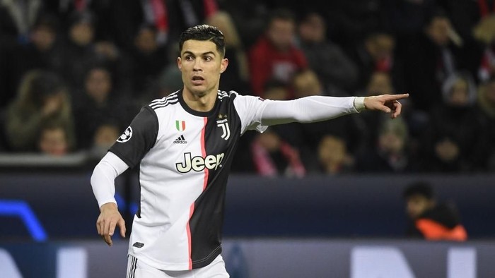 Juventus Portuguese forward Cristiano Ronaldo reacts during the UEFA Champions League Group D football match between Bayer Leverkusen and Juventus on December 11, 2019 in Leverkusen, western Germany. (Photo by INA FASSBENDER / AFP)