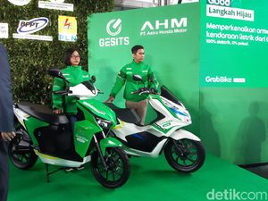 Top! Grab Bakal Pakai Motor dan Mobil Listrik