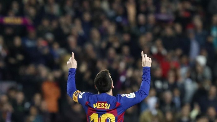 Barcelonas Lionel Messi celebrates after scoring his sides second goal during a Spanish La Liga soccer match between Barcelona and Mallorca at Camp Nou stadium in Barcelona, Spain, Saturday, Dec. 7, 2019. (AP Photo/Joan Monfort)