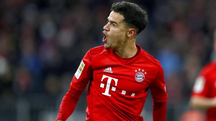 Bayerns Philippe Coutinho celebrates after scoring his sides third goal during the German Bundesliga soccer match between FC Bayern Munich and SV Werder Bremen in Munich, Germany, Saturday, Dec. 14, 2019. (AP Photo/Matthias Schrader)