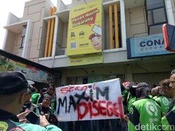 Tolak Perang Tarif, Driver Grab-Gojek Geruduk Kantor Ojol Rusia