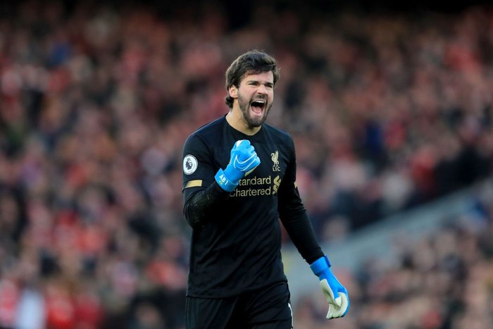 LIVERPOOL, ENGLAND - NOVEMBER 30: Alisson of Liverpool celebrates  during the Premier League match between Liverpool FC and Brighton & Hove Albion at Anfield on November 30, 2019 in Liverpool, United Kingdom. (Photo by Marc Atkins/Getty Images)