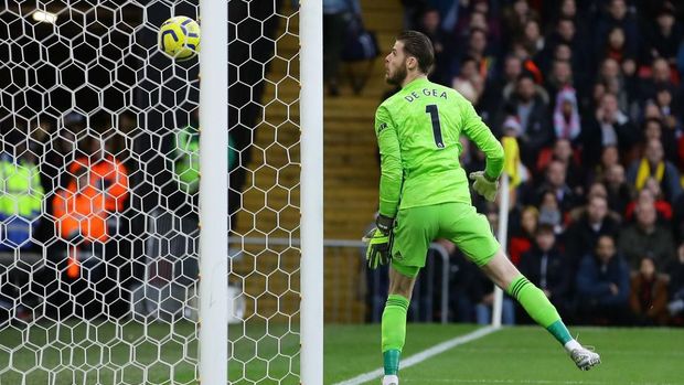 WATFORD, ENGLAND - DECEMBER 22: David De Gea of Manchester United fails to save a shot from Ismaila Sarr of Watford (not pictured) which results in the first goal for Watford scored by Ismaila Sarr of Watford during the Premier League match between Watford FC and Manchester United at Vicarage Road on December 22, 2019 in Watford, United Kingdom. (Photo by Richard Heathcote/Getty Images)