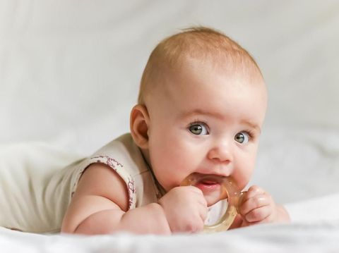 Cute baby with teether