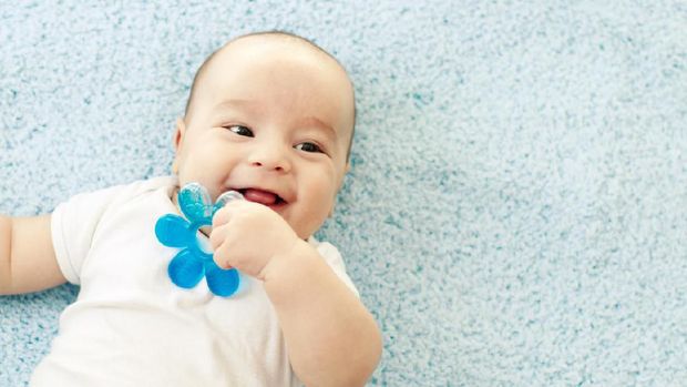 Cute baby with teether
