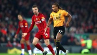 Wolves menekan Liverpool guna mencari gol penyeimbang. Clive Brunskill/Getty Images.