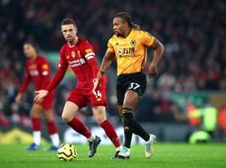 Wolves menekan Liverpool guna mencari gol penyeimbang. Clive Brunskill/Getty Images.