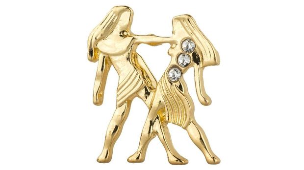 Woman zodiac brooches. Beautiful collection of brooches in the shape of the zodiac signs, gold with diamonds, isolated on white background, clipping paths included