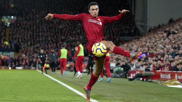 Liverpool's Trent Alexander-Arnold controls the ball during the English Premier League soccer match between Liverpool and Sheffield United at Anfield Stadium, Liverpool, England, Thursday, Jan. 2, 2020. (AP Photo/Jon Super)