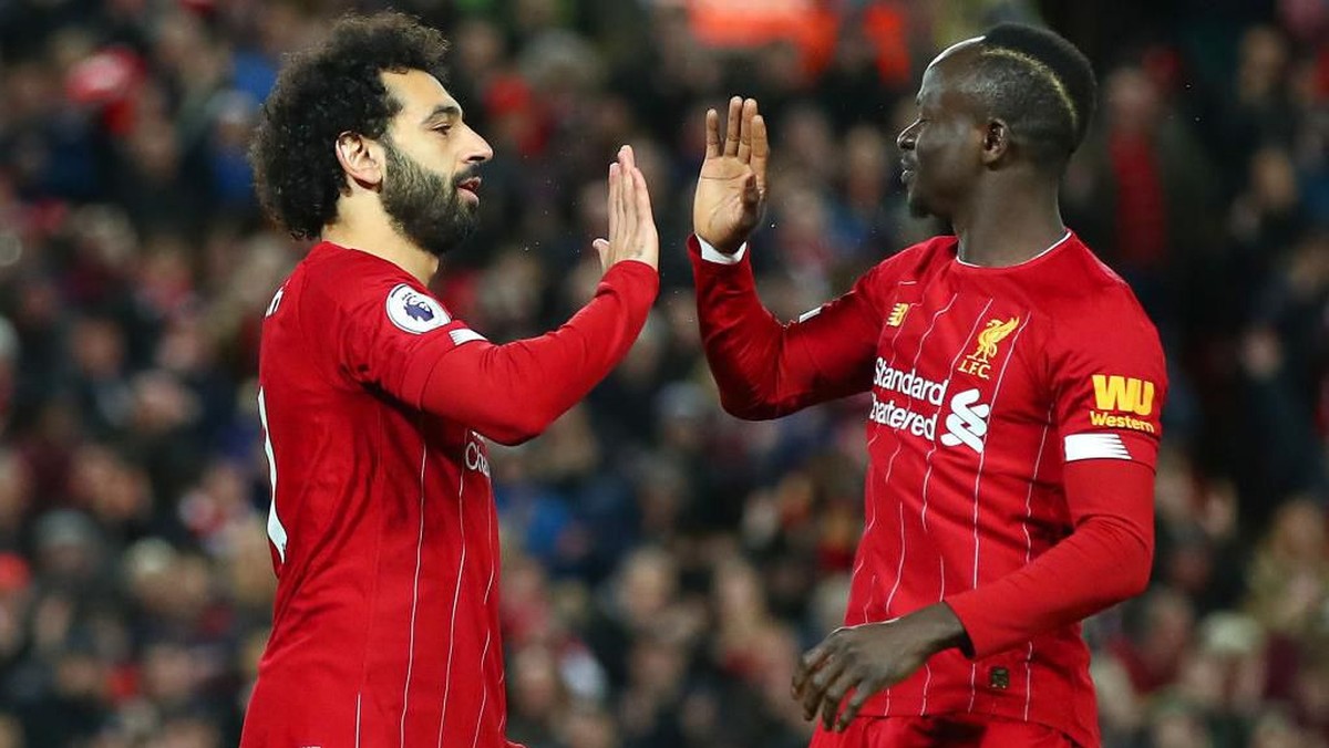 Liverpool tak terkalahkan selama satu tahun kalender di Liga Inggris (Clive Brunskill/Getty Images)
