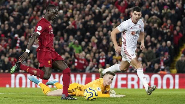 Mane mencetak gol kedua Liverpool. (