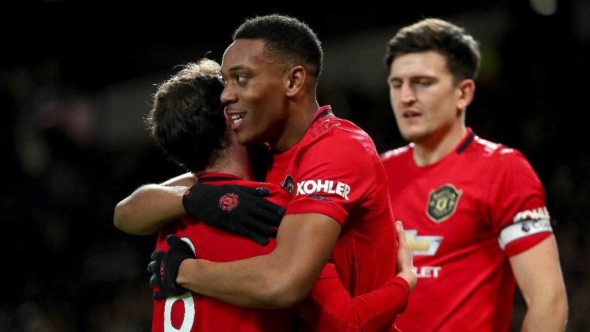 Manchester United saat ini masih menjadi tim Inggris dengan pendapatan tertinggi di dunia (Foto: Catherine Ivill / Getty Images)