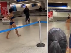 Wanita Berjalan Telanjang Hebohkan Bandara