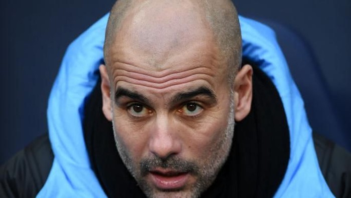 MANCHESTER, ENGLAND - JANUARY 18: Joesep Guardiola of Manchester City looks on ahead of the Premier League match between Manchester City and Crystal Palace at Etihad Stadium on January 18, 2020 in Manchester, United Kingdom. (Photo by Laurence Griffiths/Getty Images)