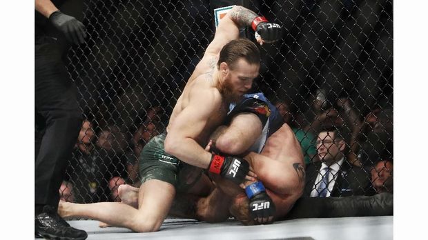 Conor McGregor saat mengalahkan Cowboy Cerrone. (