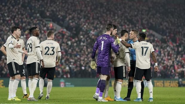 MU kalah 0-2 dari Liverpool.