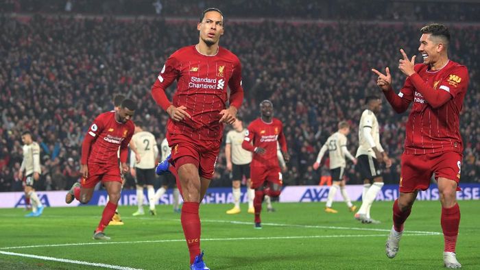 Gol Virgil van Dijk dan Mohamed Salah menangkan Liverpool atas Man Utd (Foto: Photo by Michael Regan/Getty Images)