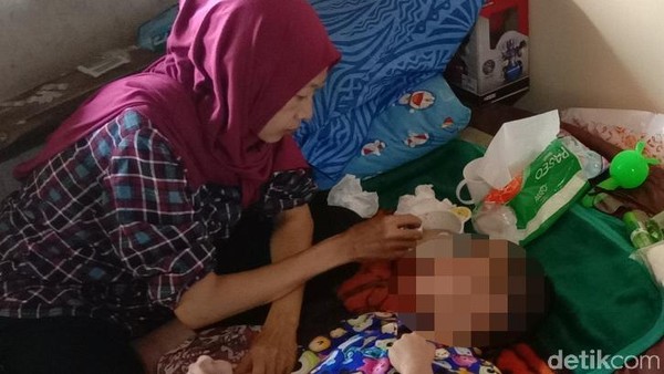 Foto: Muhammad Rizky Anugerah (7) yang diduga menjadi korban penganiayaan orang tua kandungnya (Wisma Putra/detikcom)