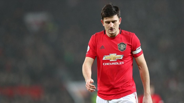 MANCHESTER, ENGLAND - JANUARY 22: Harry Maguire of Manchester United walks off dejected after defeat in the Premier League match between Manchester United and Burnley FC at Old Trafford on January 22, 2020 in Manchester, United Kingdom. (Photo by Alex Livesey/Getty Images)