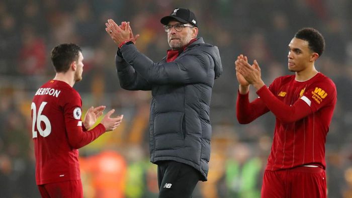 Juergen Klopp WOLVERHAMPTON, ENGLAND - JANUARY 23: Jurgen Klopp, manager of Liverpool, Andrew Robertson and Trent Alexander-Arnold applaud the fans after the Premier League match between Wolverhampton Wanderers and Liverpool FC at Molineux on January 23, 2020 in Wolverhampton, United Kingdom. (Photo by Catherine Ivill/Getty Images)