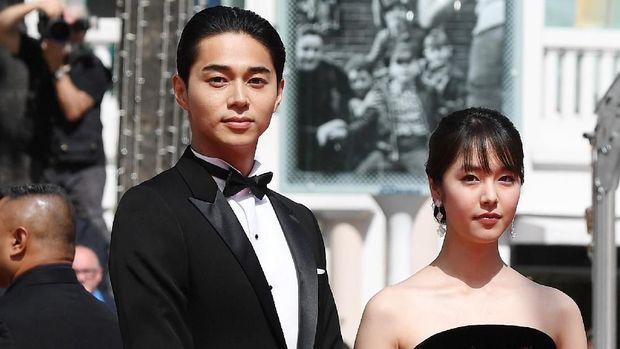 CANNES, FRANCE - MAY 14:  Actor Masahiro Higashide, actress Erika Karata and director Ryusuke Hamaguchi attend the screening of 