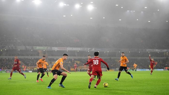 Liverpool memenangi laga sulit di markas Wolverhampton Wanderers. (Foto: Michael Regan/Getty Images)