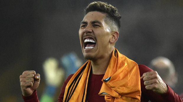 Roberto Firmino merayakan gol ke gawang Wolves. (