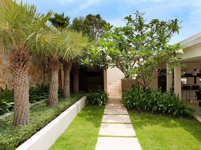 Outdoor Walkway And Courtyard In A Tropical Villa Residence.