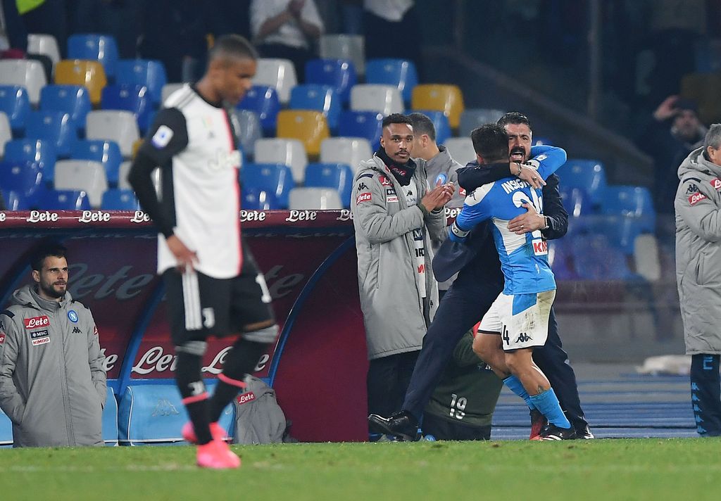 NAPLES, ITALY - JANUARY 26: Gennaro Gattuso SSC Napoli coach and Lorenzo Insigne of SSC Napoli celebrate the 2-0 goal scored by Lorenzo Insigne as Douglas Costa of Juventus reacts during the Serie A match between SSC Napoli and  Juventus at Stadio San Paolo on January 26, 2020 in Naples, Italy. (Photo by Francesco Pecoraro/Getty Images)