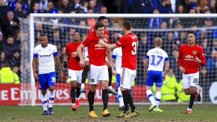 Manchester Uniteds Harry Maguire celebrates scoring against Tranmere Rovers during the English FA Cup fourth round soccer match at Prenton Park, Birkenhead, England, Sunday Jan. 26, 2020. (Simon Cooper/PA via AP)