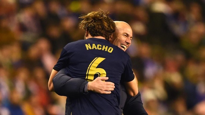 VALLADOLID, SPAIN - JANUARY 26:  Nacho Fernandez of Real Madrid (6) elebrates with Zinedine Zidane, Manager of Real Madrid as scores his teams first goal during the Liga match between Real Valladolid CF and Real Madrid CF at Jose Zorrilla on January 26, 2020 in Valladolid, Spain. (Photo by Denis Doyle/Getty Images)