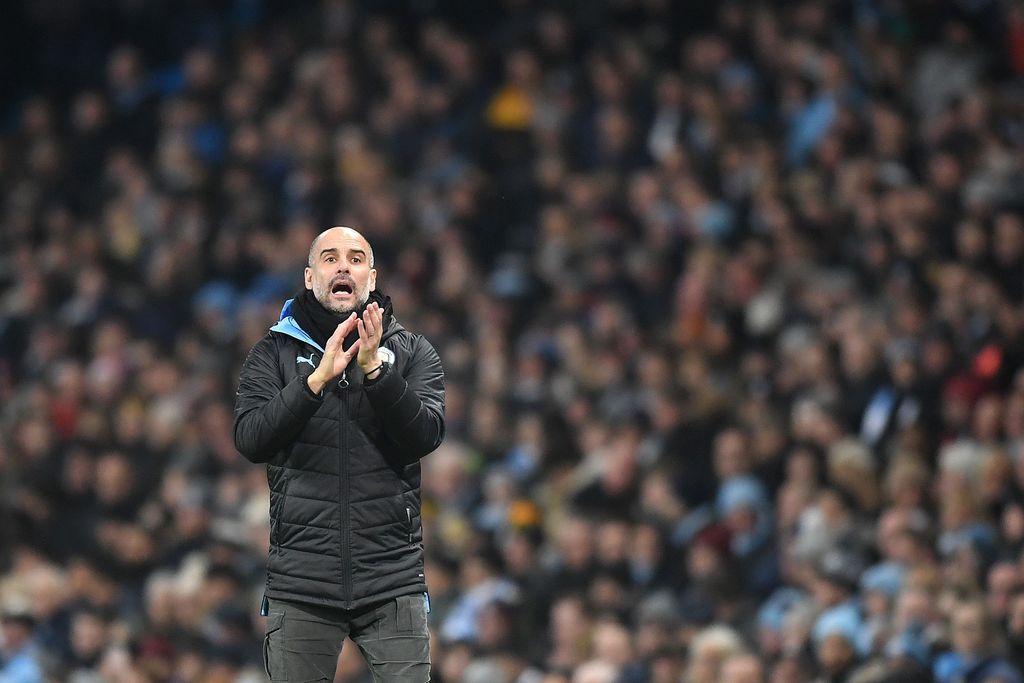 MANCHESTER, ENGLAND - JANUARY 01: Pep Guardiola, Manager of Manchester City gives his team instructions  during the Premier League match between Manchester City and Everton FC at Etihad Stadium on January 01, 2020 in Manchester, United Kingdom. (Photo by Michael Regan/Getty Images)
