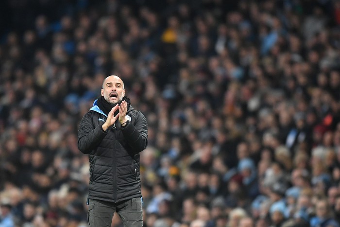 MANCHESTER, ENGLAND - JANUARY 01: Pep Guardiola, Manager of Manchester City gives his team instructions  during the Premier League match between Manchester City and Everton FC at Etihad Stadium on January 01, 2020 in Manchester, United Kingdom. (Photo by Michael Regan/Getty Images)