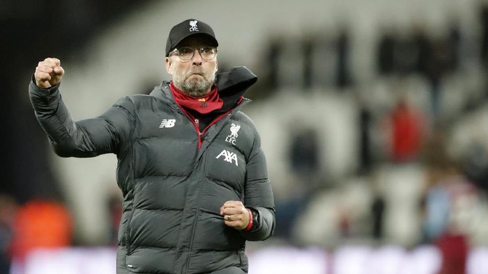 Liverpools manager Jurgen Klopp celebrates at the end of the English Premier League soccer match between West Ham Utd and Liverpool at the London Stadium in London, Wednesday, Jan. 29, 2020. (AP Photo/Frank Augstein)