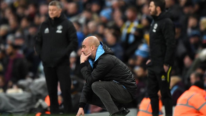 MANCHESTER, ENGLAND - JANUARY 29: Pep Guardiola, Manager of Manchester City reacts during the Carabao Cup Semi Final match between Manchester City and Manchester United at Etihad Stadium on January 29, 2020 in Manchester, England. (Photo by Shaun Botterill/Getty Images)
