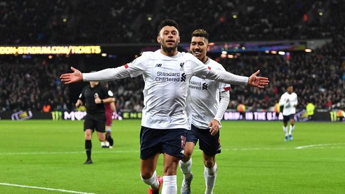 Alex Oxlade-Chamberlain LONDON, ENGLAND - JANUARY 29: Alex Oxlade-Chamberlain of Liverpool celebrates after scoring his teams second goal during the Premier League match between West Ham United and Liverpool FC at London Stadium on January 29, 2020 in London, United Kingdom. (Photo by Justin Setterfield/Getty Images)