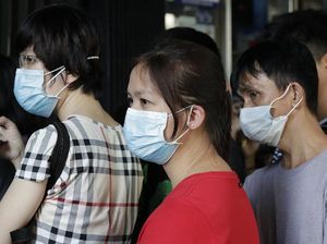 Viral Masker Direbus untuk Dipakai Ulang di China, Berbahayakah?