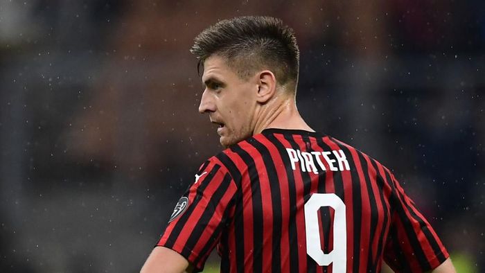 AC Milans Polish forward Krzysztof Piatek reacts at the end of the Italian Serie A football match AC Milan vs Lecce on October 20, 2019 at the San Siro stadium in Milan. (Photo by Miguel MEDINA / AFP)