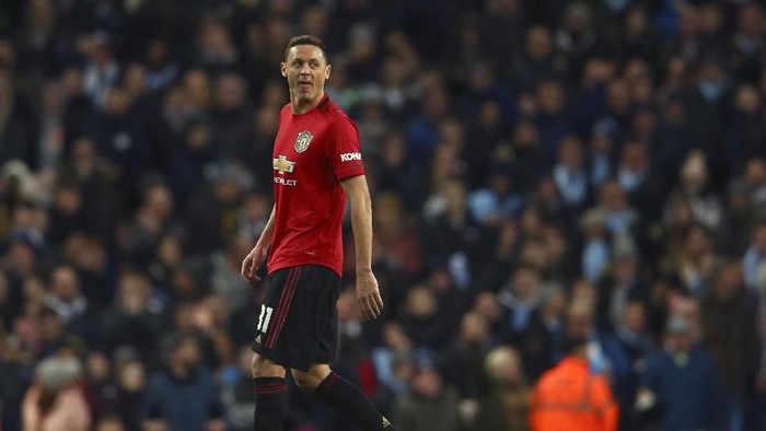 Manchester Uniteds Nemanja Matic leaves the field after being shown a second yellow card during the English League Cup semifinal second leg soccer match between Manchester City and Manchester United at Etihad stadium in Manchester, England, Wednesday, Jan. 29, 2020. (AP Photo/Dave Thompson)