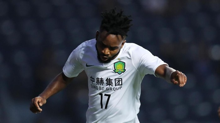 BURI RAM, THAILAND - APRIL 09: Cedric Bakambu of Beijing Guoan celebrates scoring his sides second goal during the AFC Champions League Group G match between Buriram United and Beijing Guoan at Chang Arena on April 9, 2019 in Buri Ram, Thailand. (Photo by Pakawich Damrongkiattisak/Getty Images)