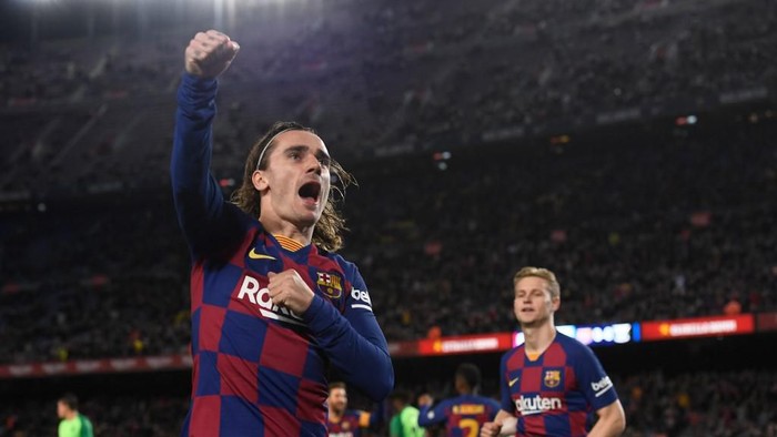 Barcelonas French forward Antoine Griezmann celebrates after scoring the opening goal during the Copa del Rey (Kings Cup) football match between FC Barcelona and Club Deportivo Leganes SAD at the Camp Nou stadium in Barcelona, on January 30, 2020. (Photo by Josep LAGO / AFP)