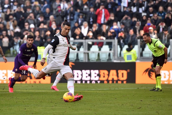 TURIN, ITALY - FEBRUARY 02: Cristiano Ronaldo of Juventus scores a penalty during the Serie A match between Juventus and  ACF Fiorentina at Allianz Stadium on February 02, 2020 in Turin, Italy. (Photo by Tullio M. Puglia/Getty Images)
