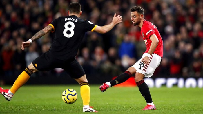 Manchester Uniteds Bruno Fernandes, controls the ball, during the English Premier League soccer match between Manchester United and Wolverhampton Wanderers, at Old Trafford, in Manchester, England, Saturday, Feb. 1, 2020. (Martin Rickett/PA via AP)