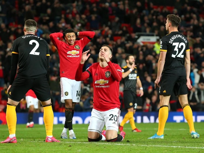 MANCHESTER, ENGLAND - FEBRUARY 01: Diogo Dalot of Manchester United reacts after a missed chance during the Premier League match between Manchester United and Wolverhampton Wanderers at Old Trafford on February 01, 2020 in Manchester, United Kingdom. (Photo by Alex Livesey/Getty Images)