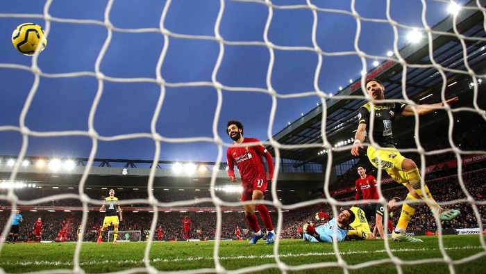 LIVERPOOL, ENGLAND - FEBRUARY 01: Mohamed Salah of Liverpool celebrates after scoring his teams fourth goal during the Premier League match between Liverpool FC and Southampton FC at Anfield on February 01, 2020 in Liverpool, United Kingdom. (Photo by Julian Finney/Getty Images)