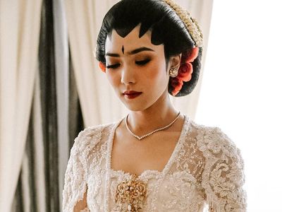 Gaya Isyana Sarasvati Berkebaya Putih Saat Menikah, Cantik Bikin Pangling