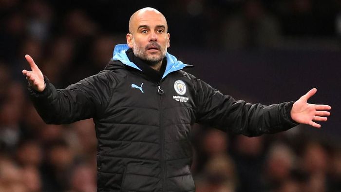 Pep Guardiola LONDON, ENGLAND - FEBRUARY 02: Pep Guardiola, Manager of Manchester City reatcs during the Premier League match between Tottenham Hotspur and Manchester City at Tottenham Hotspur Stadium on February 02, 2020 in London, United Kingdom. (Photo by Catherine Ivill/Getty Images)