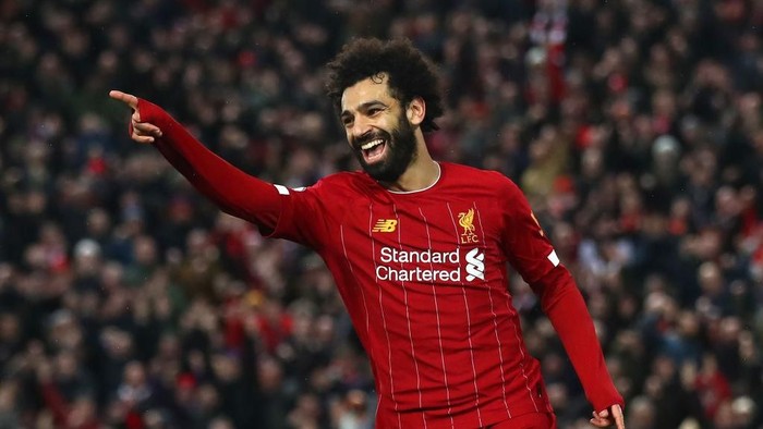LIVERPOOL, ENGLAND - FEBRUARY 01: Mohamed Salah of Liverpool celebrates after scoring his teams fourth goal during the Premier League match between Liverpool FC and Southampton FC at Anfield on February 01, 2020 in Liverpool, United Kingdom. (Photo by Julian Finney/Getty Images)