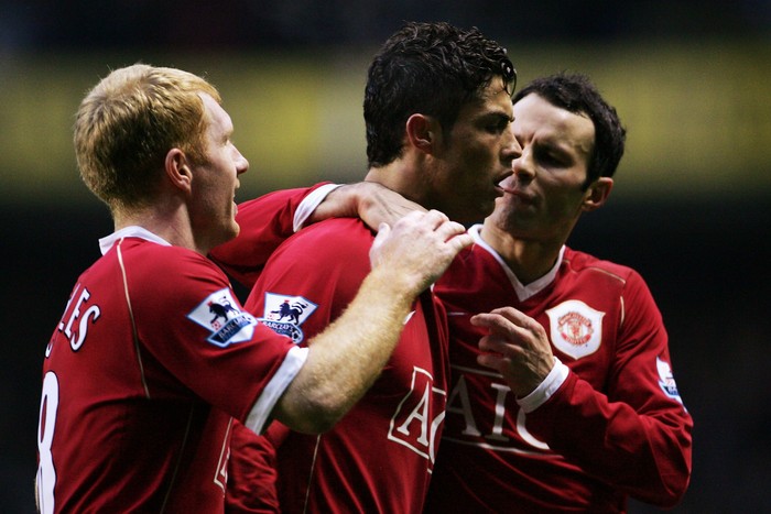LONDON - FEBRUARY 04:  Cristiano Ronaldo (C) of Manchester United celebrates after scoring a penalty with team mates Paul Scholes and Ryan Giggs during the Barclays Premiership match between Tottenham Hotspur and Manchester United at White Hart Lane on February 4, 2007 in London, England.  (Photo by Phil Cole/Getty Images)