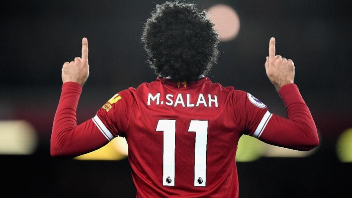 Mo Salah LIVERPOOL, ENGLAND - NOVEMBER 25: Mohamed Salah of Liverpool celebrates scoring his sides first goal during the Premier League match between Liverpool and Chelsea at Anfield on November 25, 2017 in Liverpool, England. (Photo by Shaun Botterill/Getty Images)